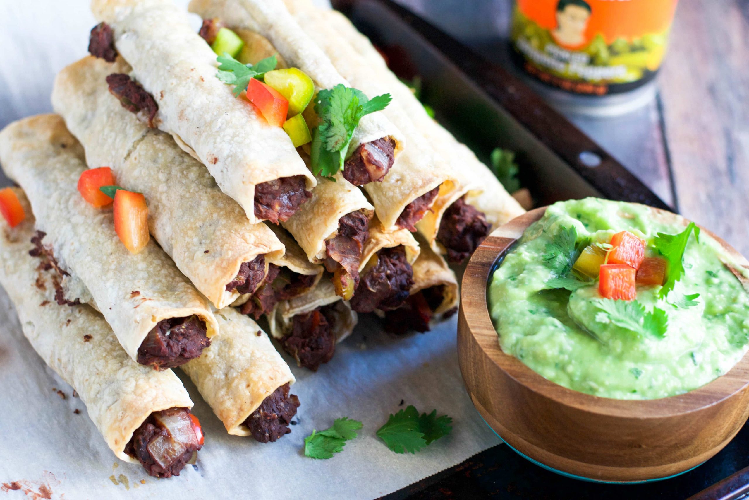 Vegan Baked Refried Bean Taquitos with Avocado Dipping Sauce