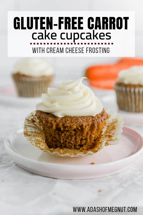 A photo of gluten free carrot cake cupcake with cream cheese frosting with the cupcake liner unwrapped. 