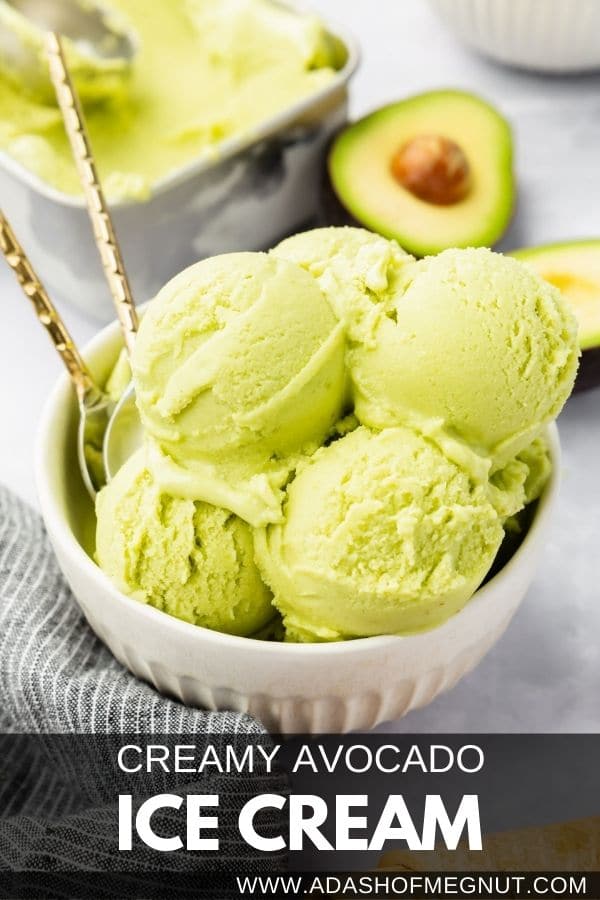 A bowl of avocado ice cream with two spoons and a fresh avocado half in the background with a text overlay.