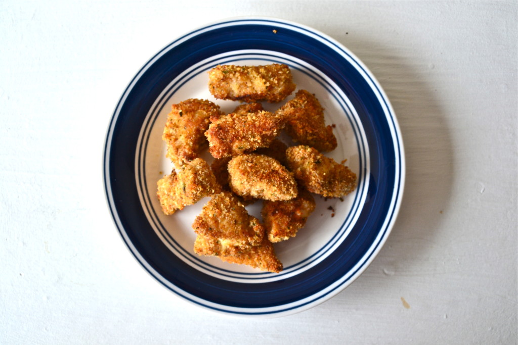 A plate of baked chicken nuggets.