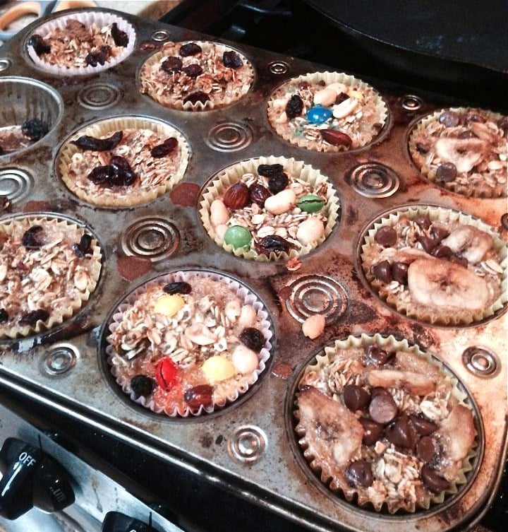 A muffin tin filled with baked oatmeal cups.