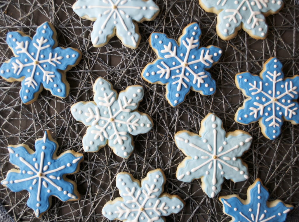 snowflake sugar cookies on a string placemat.