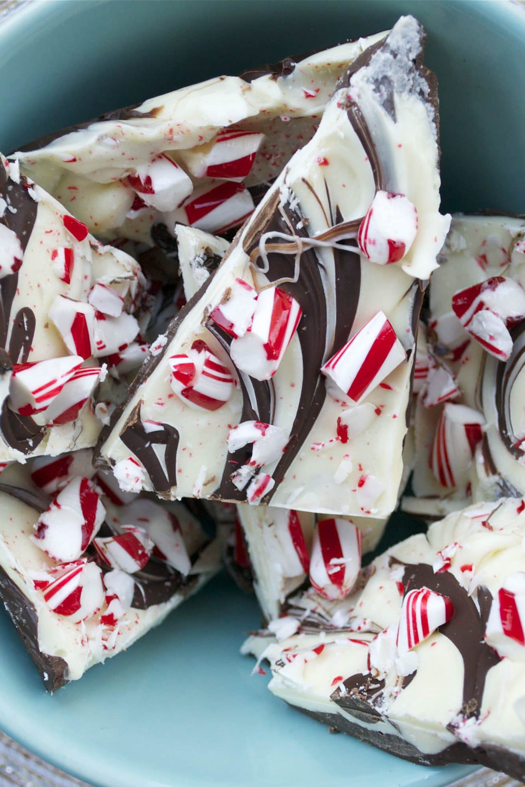 Close-up of chocolate peppermint bark showing distinct dark chocolate and white chocolate layers with crushed peppermint candy