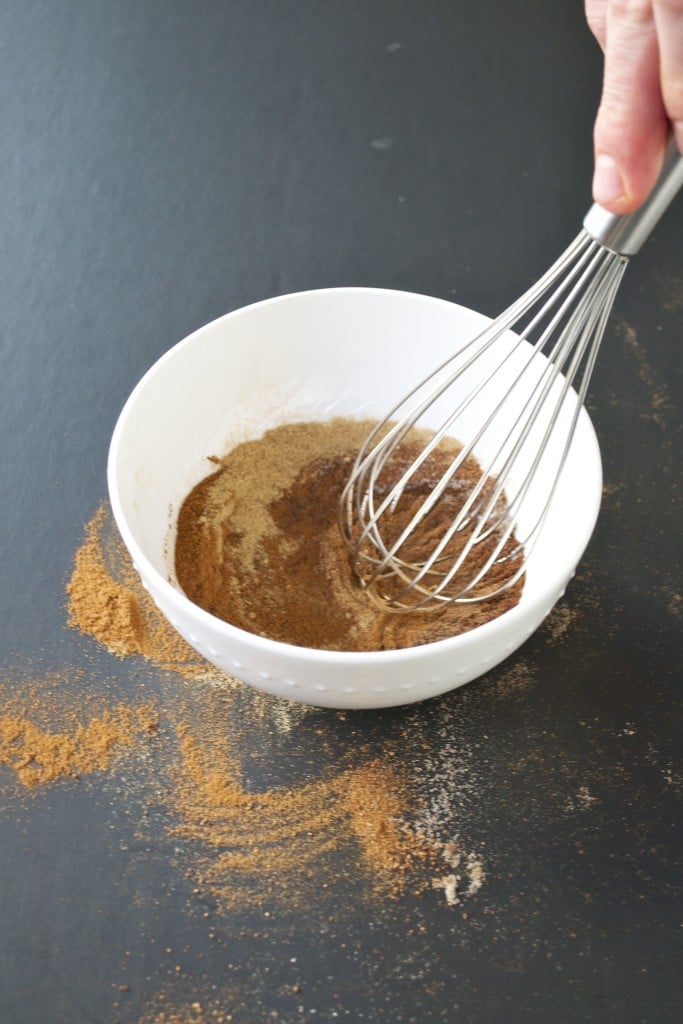 A bowl spices being whisked.