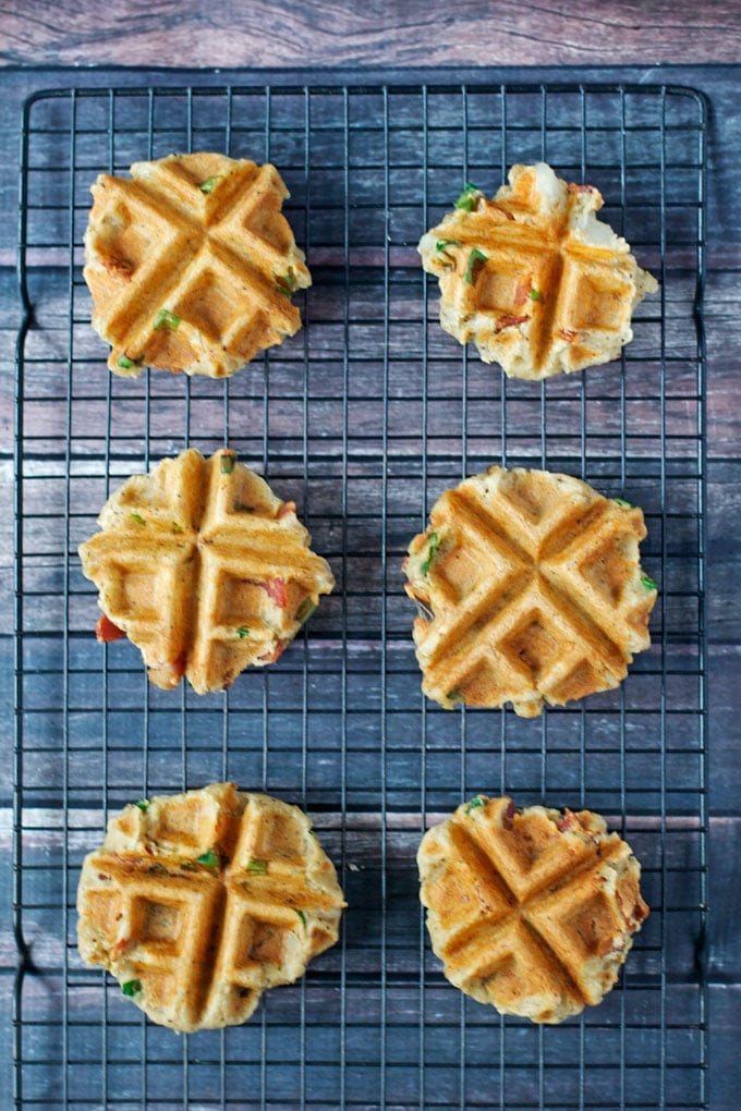 Mashed potato waffles on a cooling rack. 