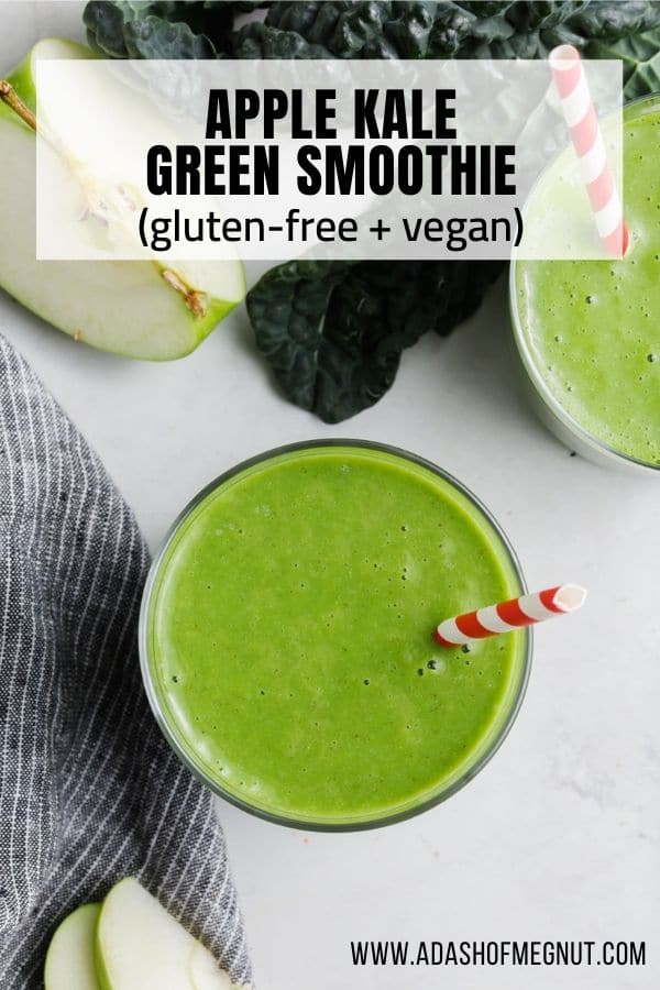 An overhead view of a glass of apple kale smoothie with a red striped straw.