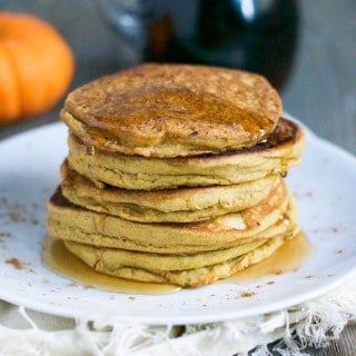 Pumpkin Spice Panckes (Vegan + GF) - you'll love how fluffy these gluten-free and vegan pumpkin spice pancakes are. Perfect for Fall! Just drizzle with some pure maple syrup or maybe some sauteed apples and vegan caramel sauce for an extra little treat! Great for weekend brunch, too! Recipe from A Dash of Megnut - see www.adashofmegnut.com