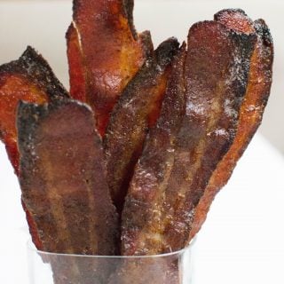 Gingerbread candied bacon, molasses, ginger, cloves, cinnamon, brown sugar, all baked in the oven to perfection. Gluten-free too!