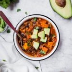 Sweet potato turkey chili with avocado and cilantro.