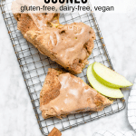 Scones have never been easier to make with this gluten-free vegan apple cinnamon scones recipe. They only require a few ingredients and are so easy to make. Simple fall ingredients, like apples and cinnamon, give these scones a delightful autumnal flavor. Drizzle with cinnamon apple cider glaze for a sweet bite. Perfect with a big mug of coffee for breakfast or warm apple cider. #glutenfree #entertaining #brunch #dairyfree #vegan