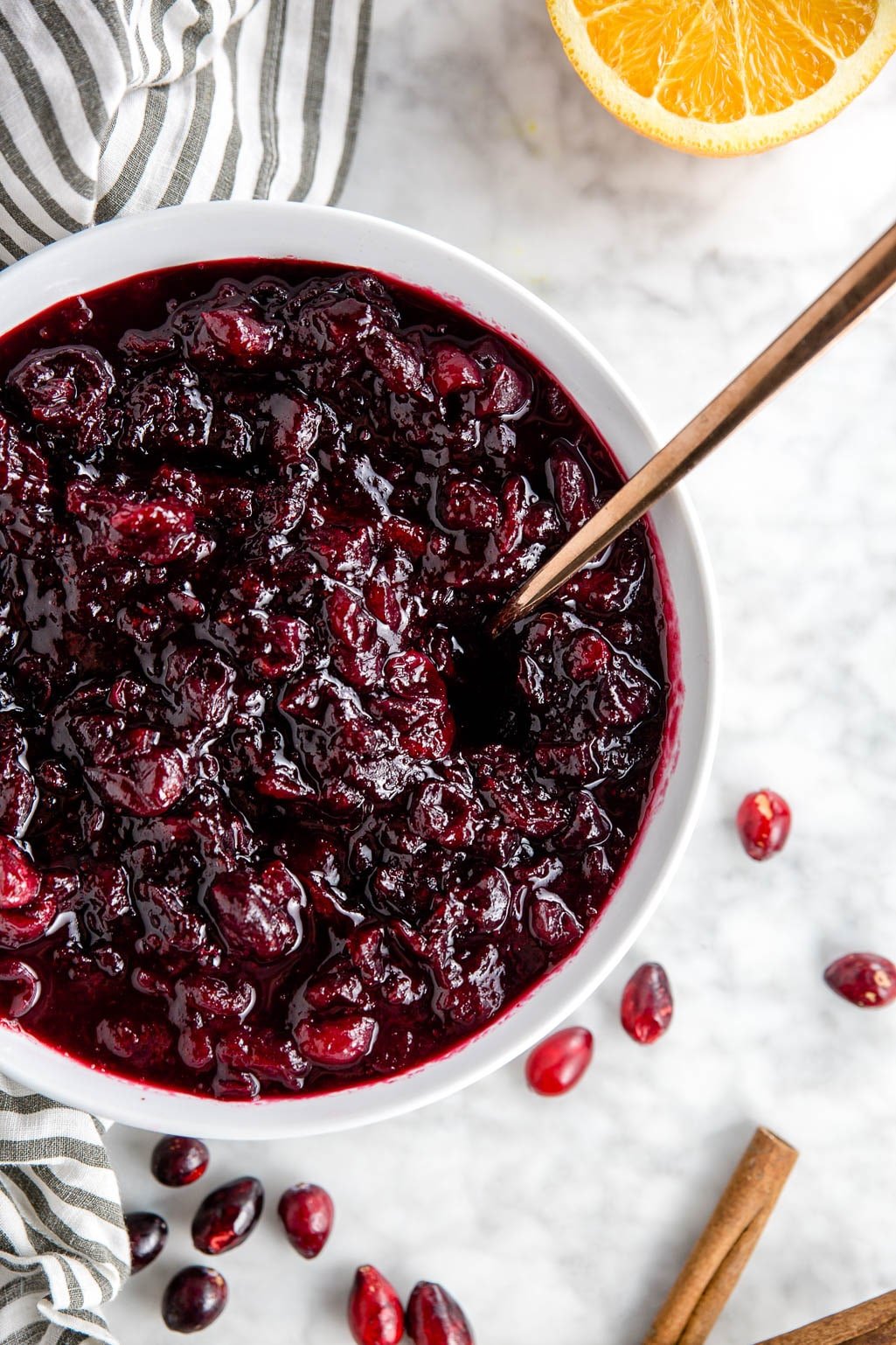 A big bowl of red wine cranberry sauce with orange juice. 