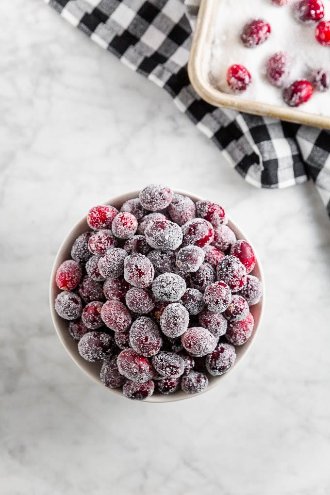 A bowl of sparkling cranberries.