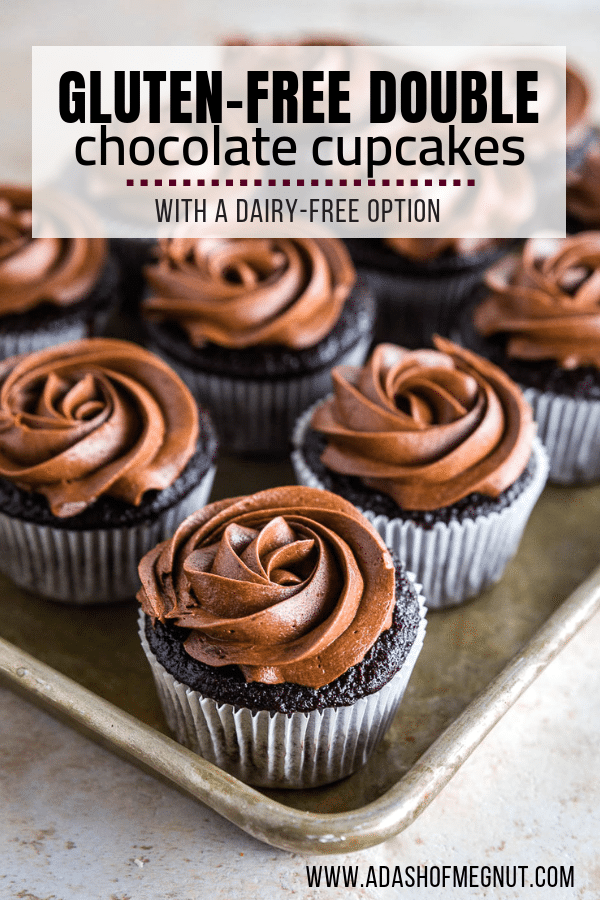 Photo of a sheet pan filled with a dozen gluten-free chocolate cupcakes with chocolate buttercream frosting. 