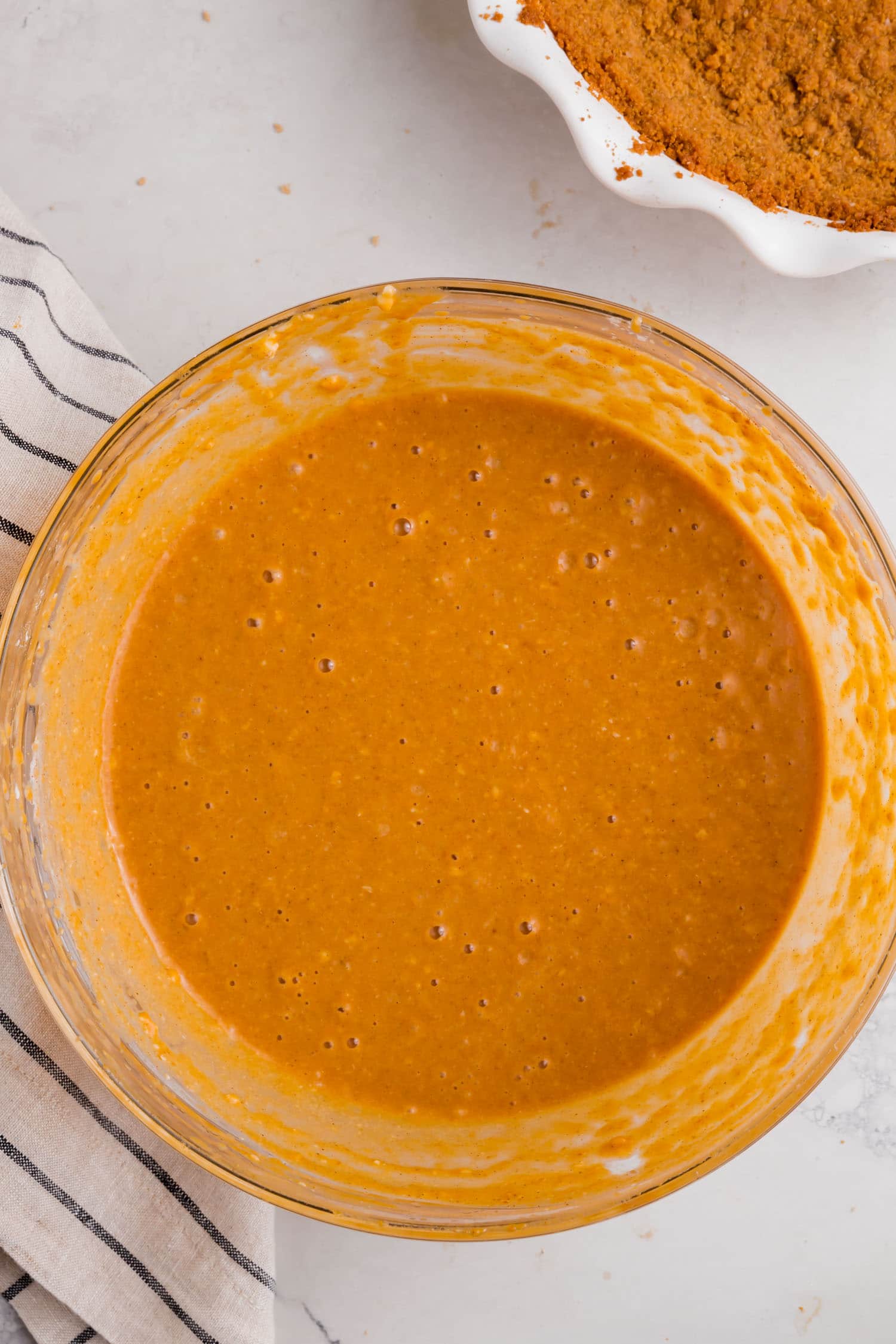 A bowl of pumpkin pie filling.