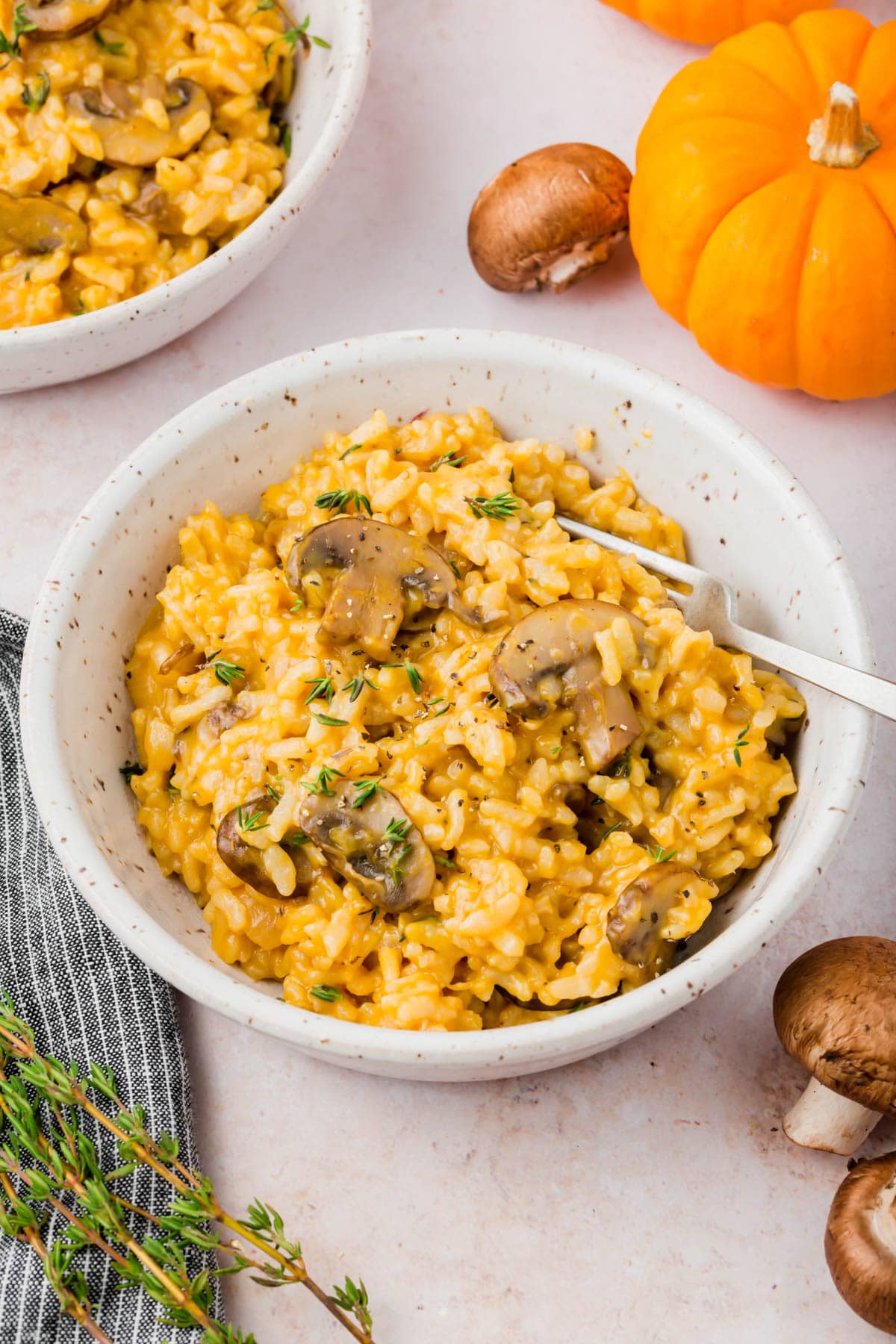 A bowl of instant pot pumpkin mushroom risotto.