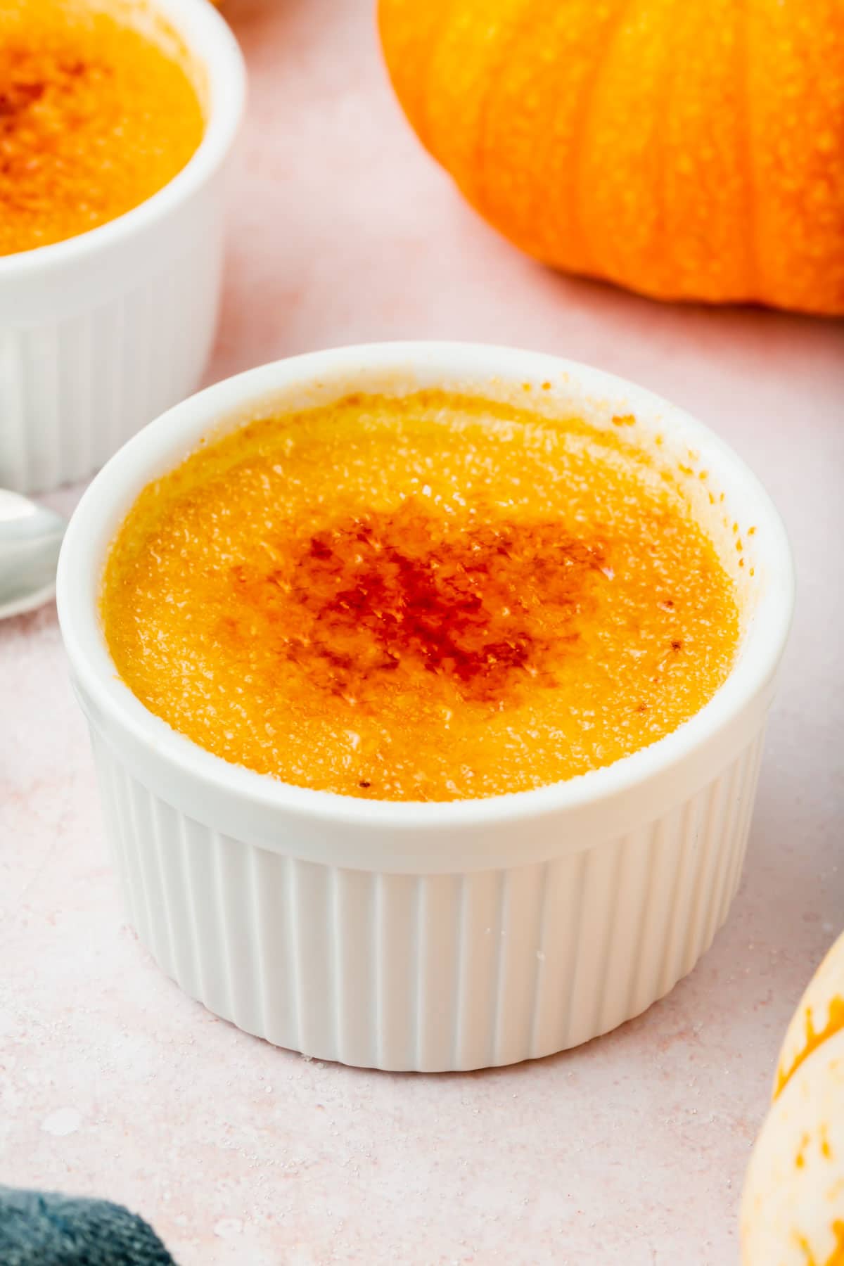 A small ramekin of pumpkin crème brûlée.