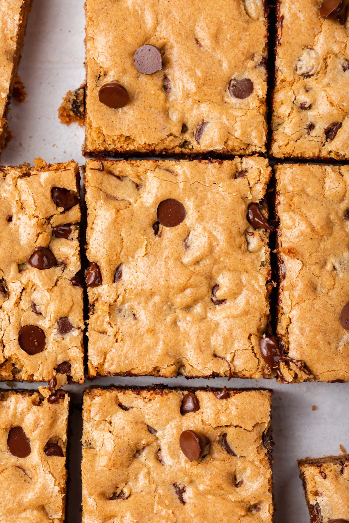 A tray of gluten-free chocolate chip cookie bars.