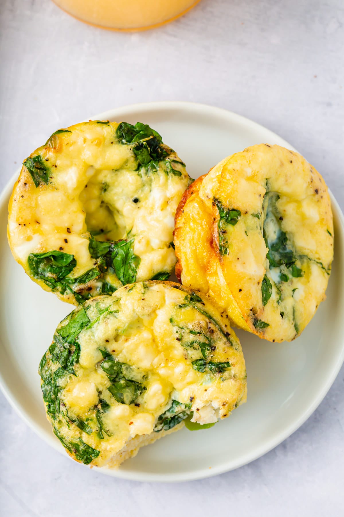 A plate of spinach feta egg muffins.