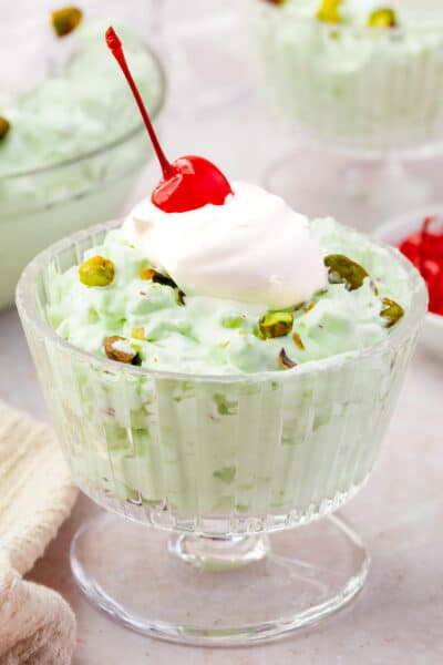 A cup of watergate salad or pistachio fluff pudding.