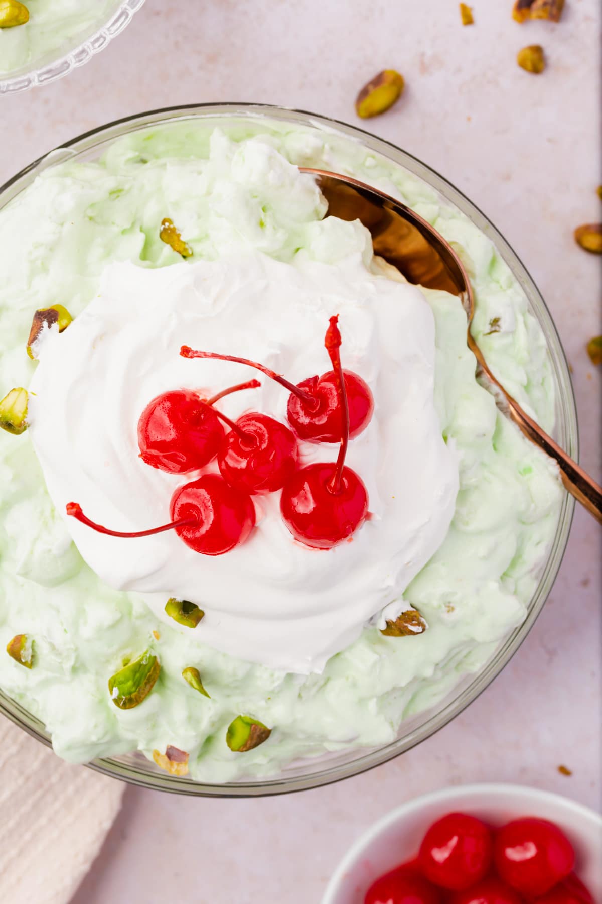 A bowl of watergate salad or pistachio fluff pudding seen from above.