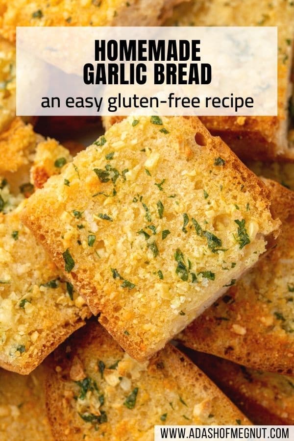 A closeup of pile of garlic bread pieces with a text overlay.