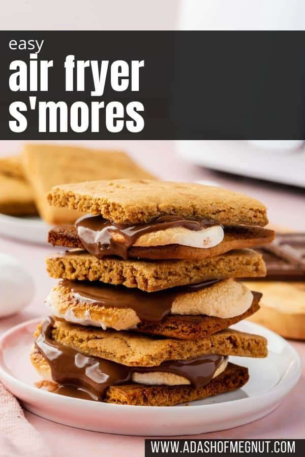 A stack of three s'mores on a plate with an air fryer and gluten-free graham crackers in the background