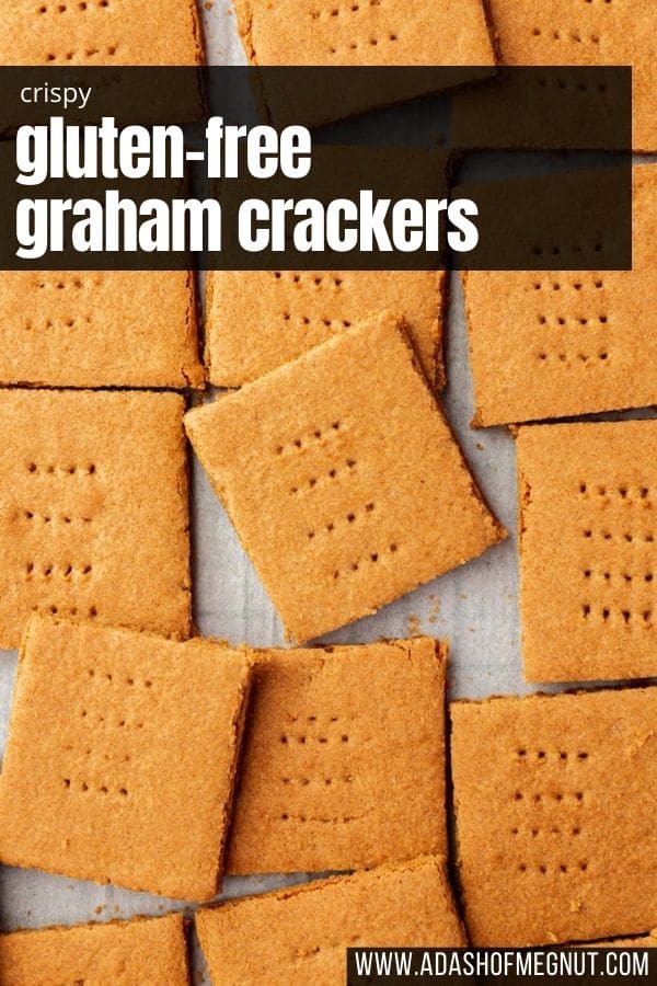 Graham crackers slightly overlapping each other on a piece of parchment paper with a text overlay.