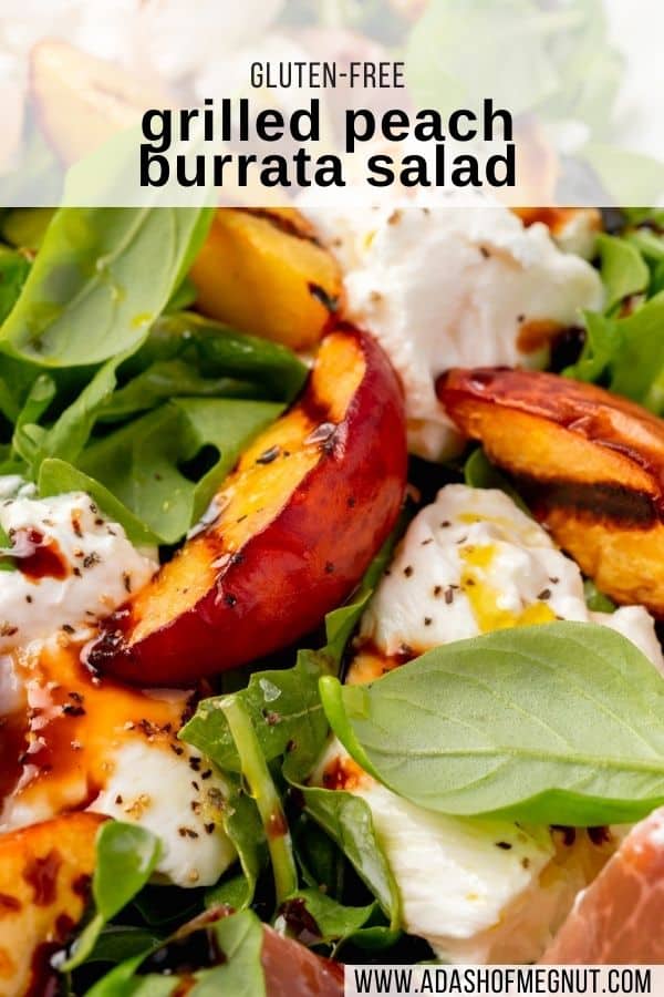 A close up of peach and arugula salad with basil, burrata, balsamic glaze and black pepper.