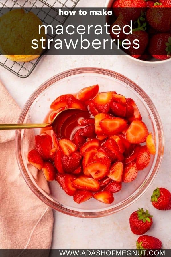 A bowl of macerated strawberries with a spoon.