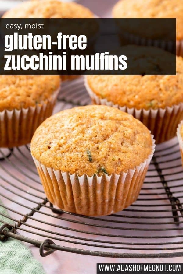 A close up of a gluten-free zucchini muffin on a round cooling rack with a text overlay.