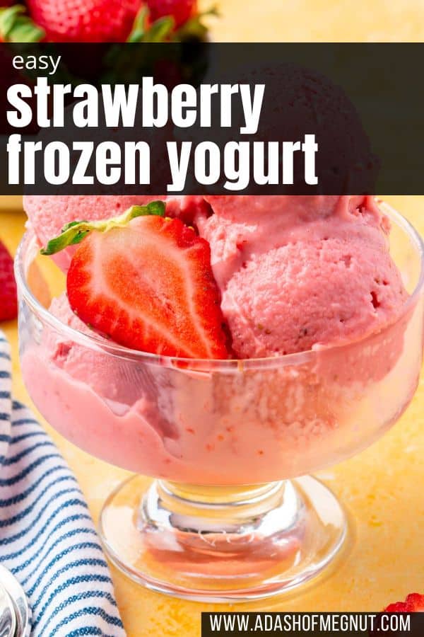 A glass bowl of scoops of strawberry frozen yogurt with slices of fresh strawberries on top.