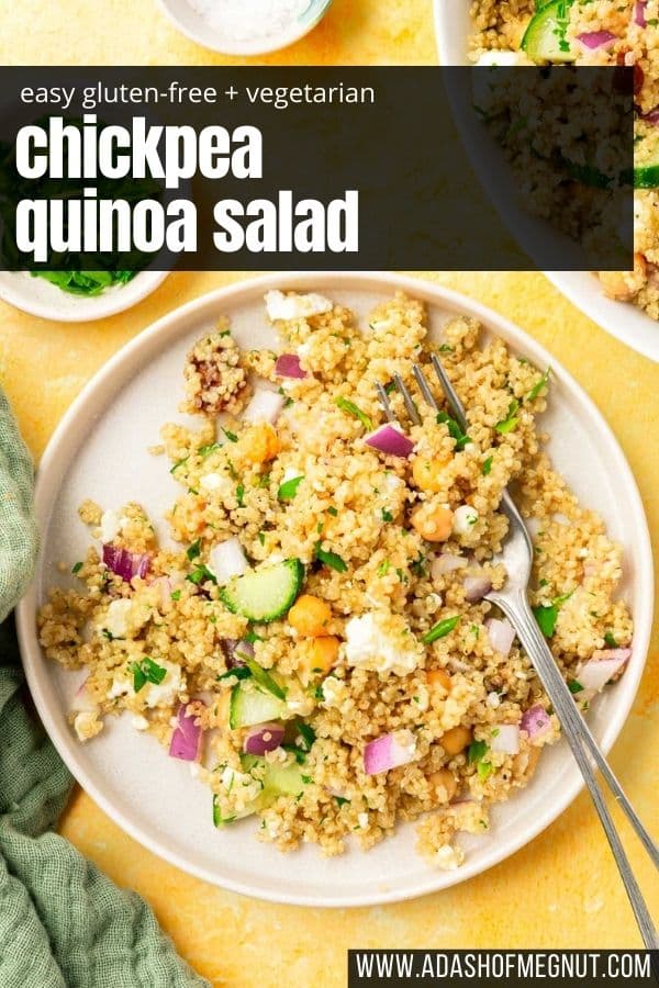 An overhead view of chickpea quinoa salad topped with red onion, dates, feta, and cucumber on a salad plate with a fork with a text overlay over the image.