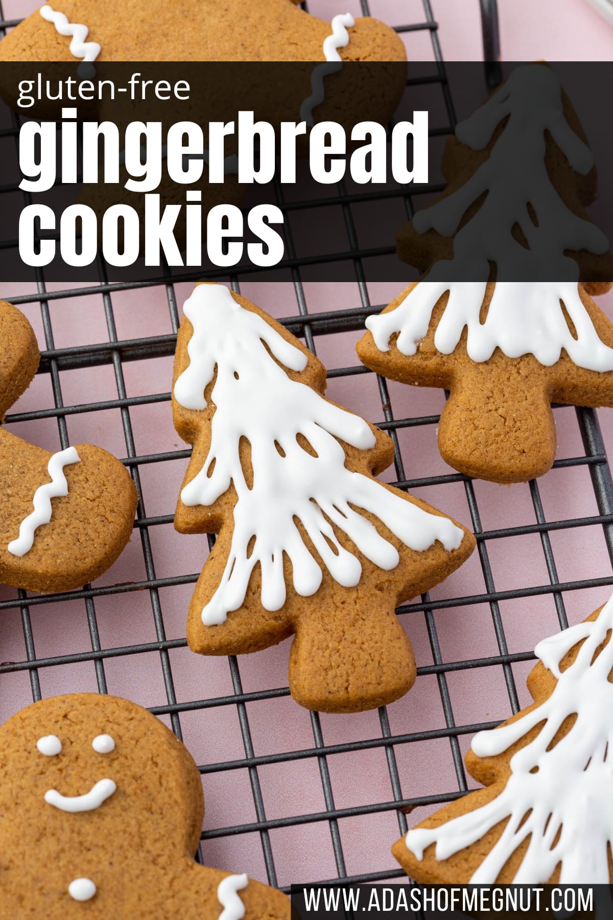 A cooling rack with gluten-free gingerbread men and gingerbread christmas tree cookies on it frosted with white royal icing.