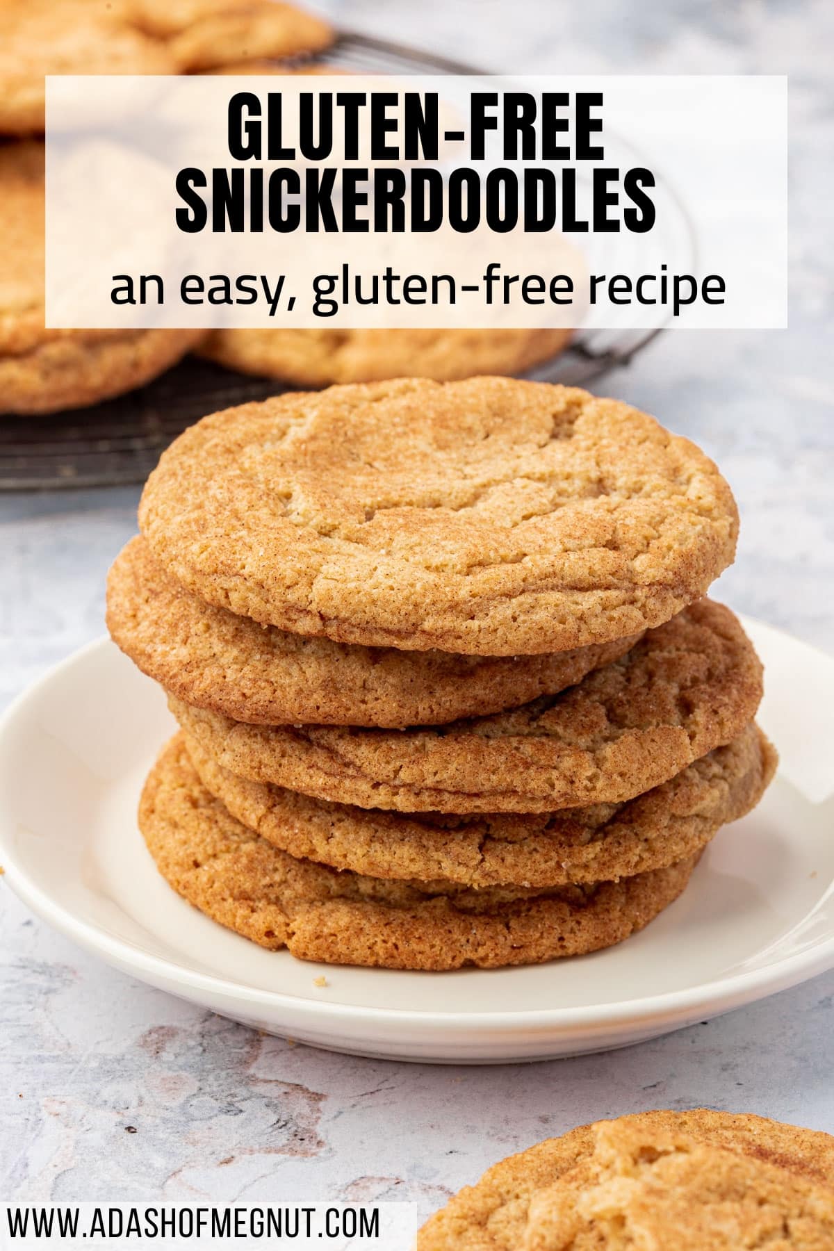 A stack of gluten-free snickerdoodle cookies on a small dessert plate.