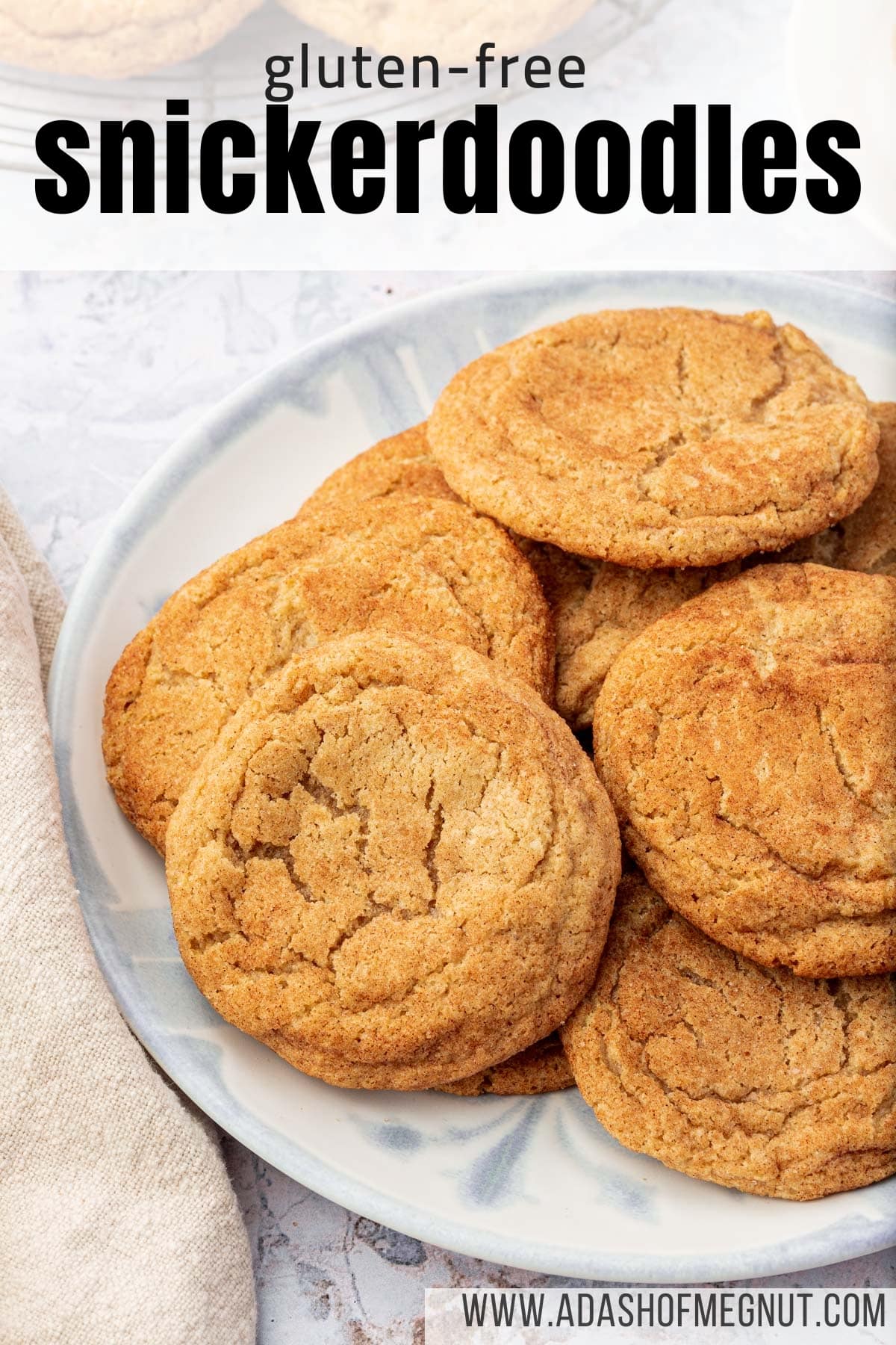 A pile of gluten-free snickerdoodles on a blue plate with a text overlay over the image.