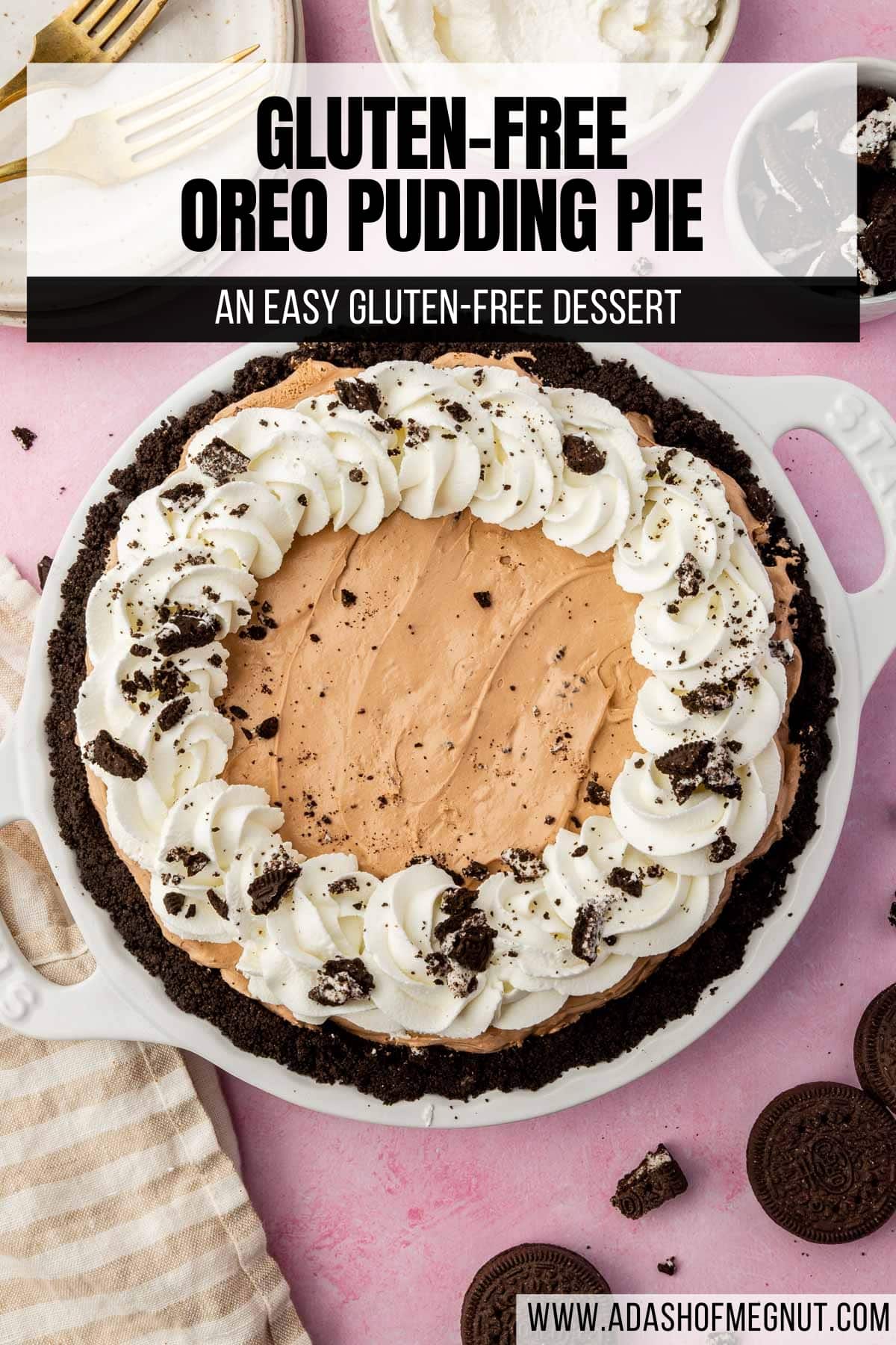 An overhead view of a gluten-free Oreo pudding pie on a pink table.