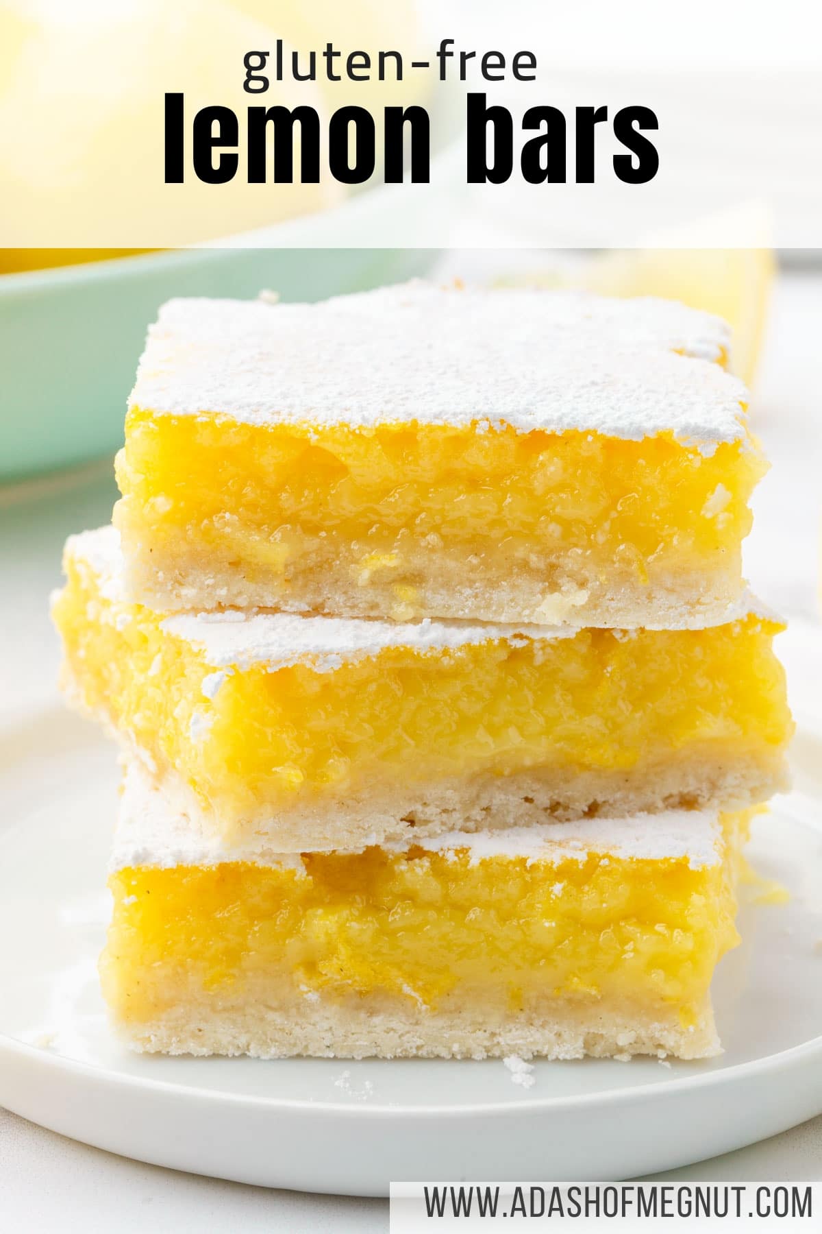 A stack of three gf lemon bars on a dessert plate.