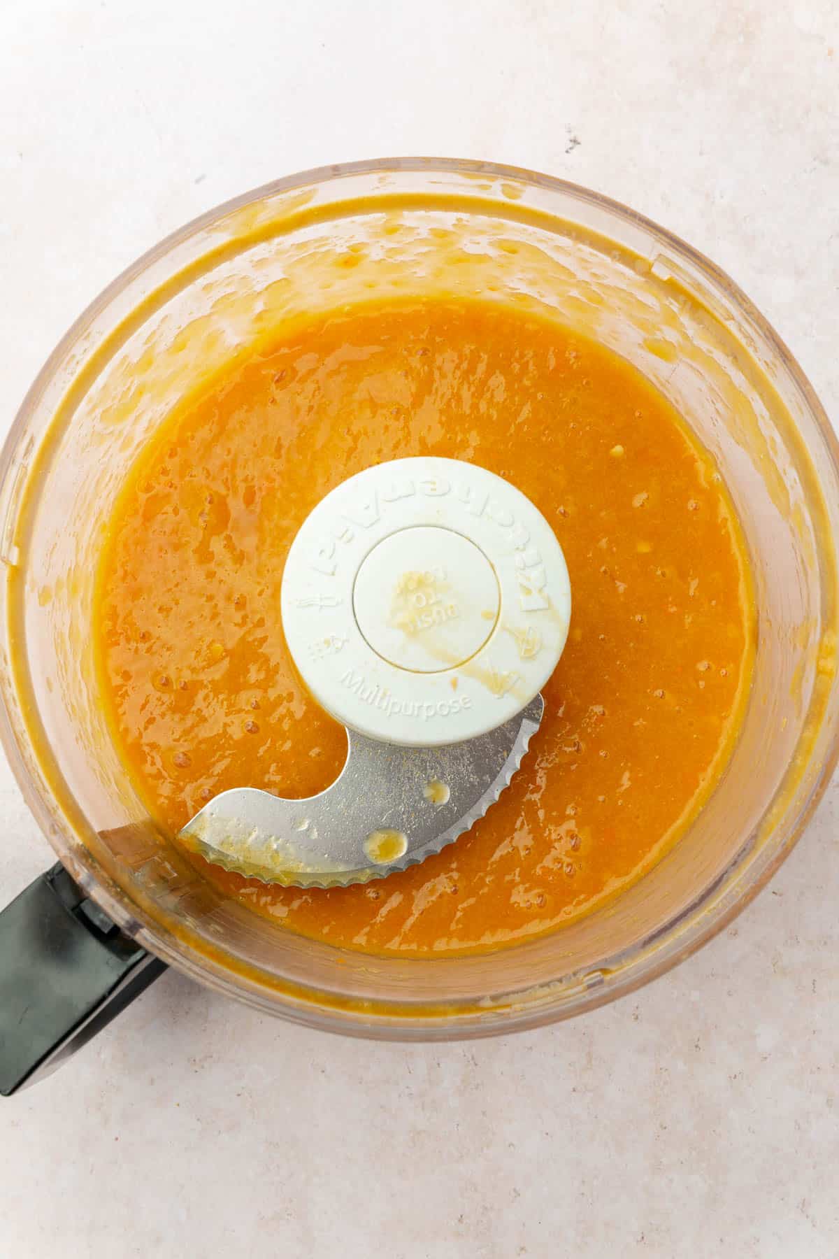 A food processor of mango habanero sauce.