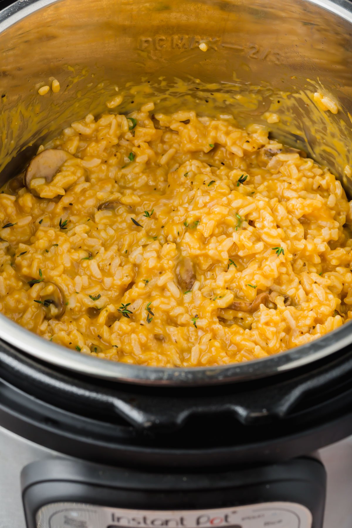 Pumpkin risotto with mushrooms in an Instant pot.