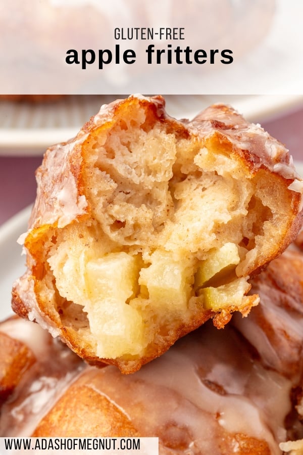 Pinterest pin image showing a close-up of a bitten gluten-free apple fritter with visible apple chunks, captioned ‘Gluten-Free Apple Fritters’ with the website URL, www.adashofmegnut.com.