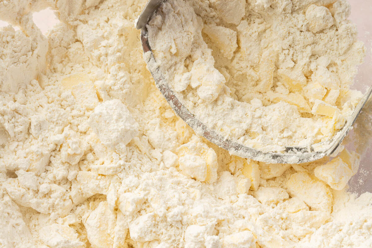 Large mixing bowl with gluten free pop tart dough being mixed together.