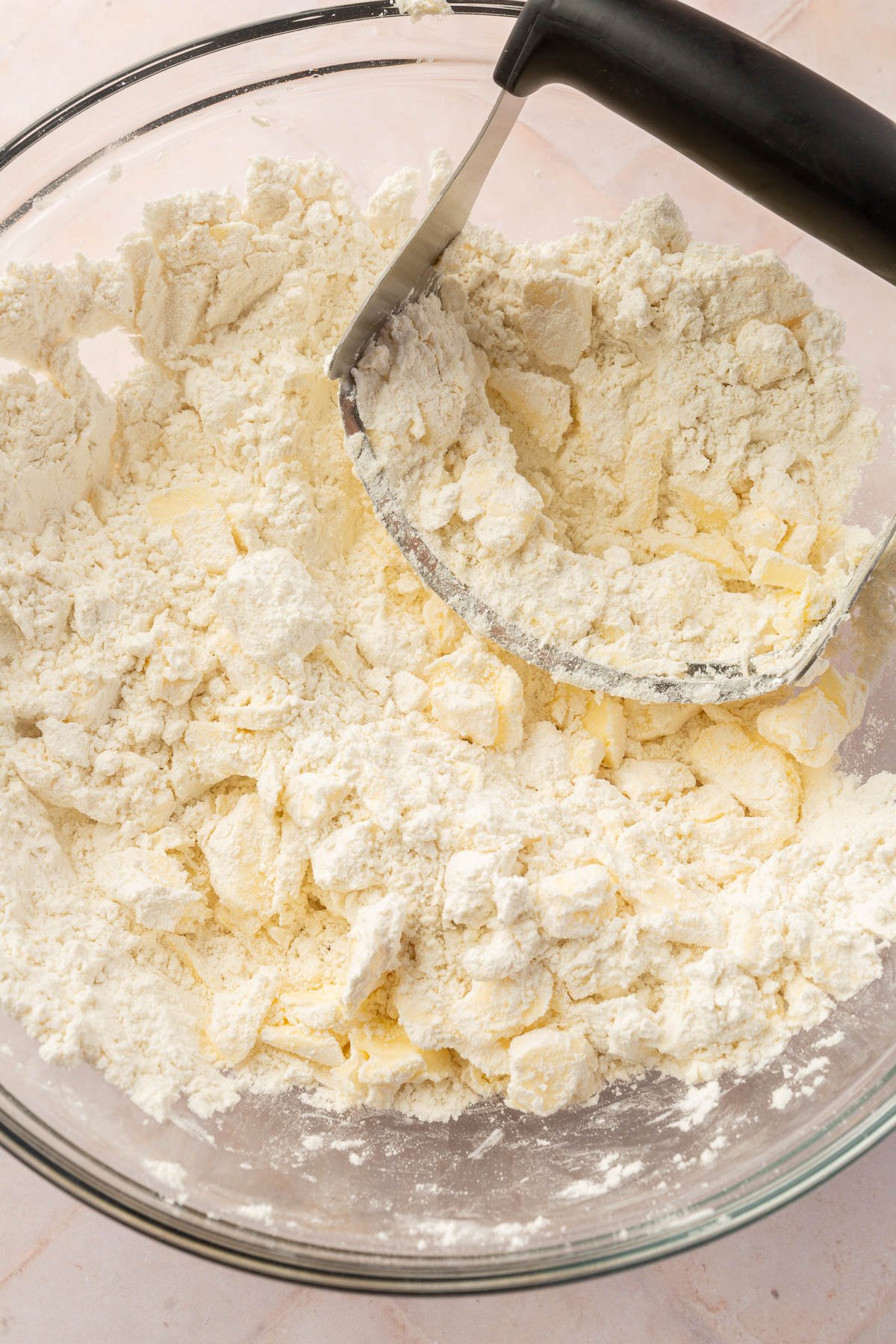 Large mixing bowl with gluten free pop tart dough being mixed together.