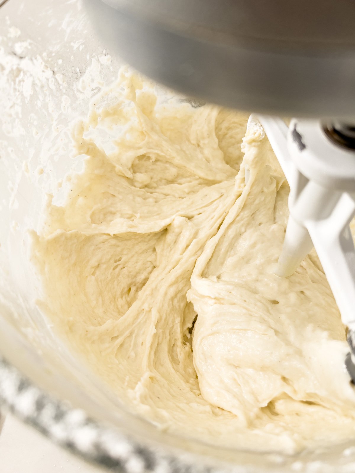 Gluten-free focaccia dough after mixing, showing a thick and sticky consistency.