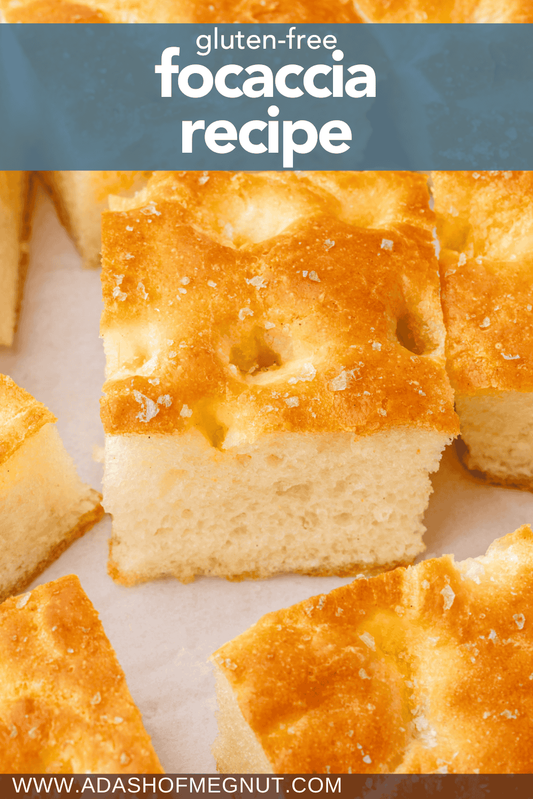 Close-up of fluffy gluten-free focaccia cut into squares with a golden crust and visible dimpled texture, labeled as gluten-free focaccia recipe.
