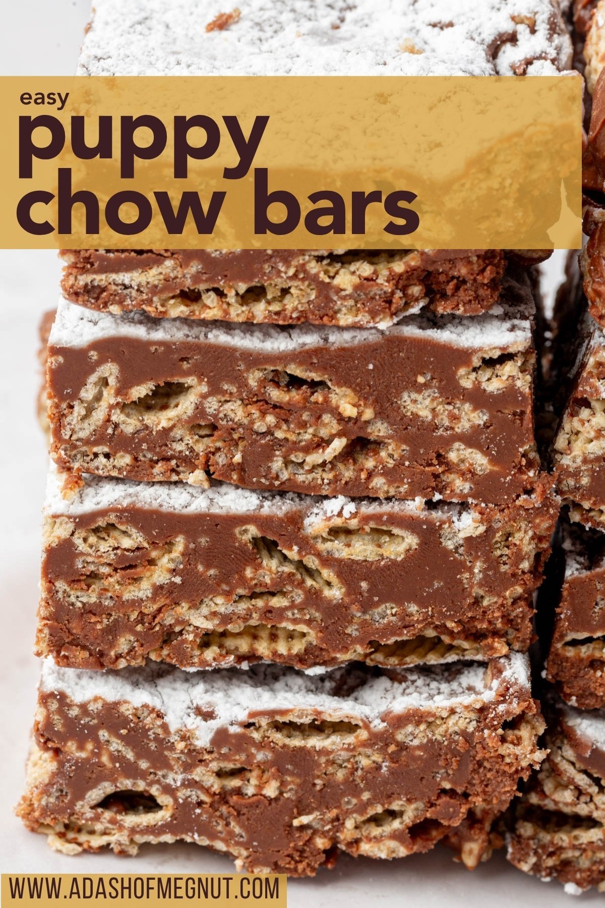 Stack of easy puppy chow bars with powdered sugar and chocolate-peanut butter layers.