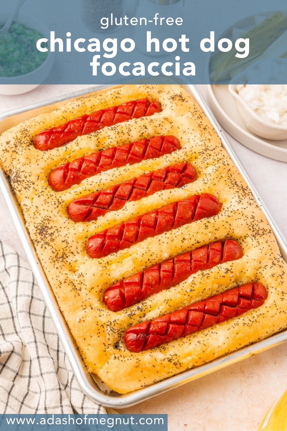 Gluten-free Chicago hot dog focaccia with poppy seeds and crosshatched hot dogs in a baking pan.
