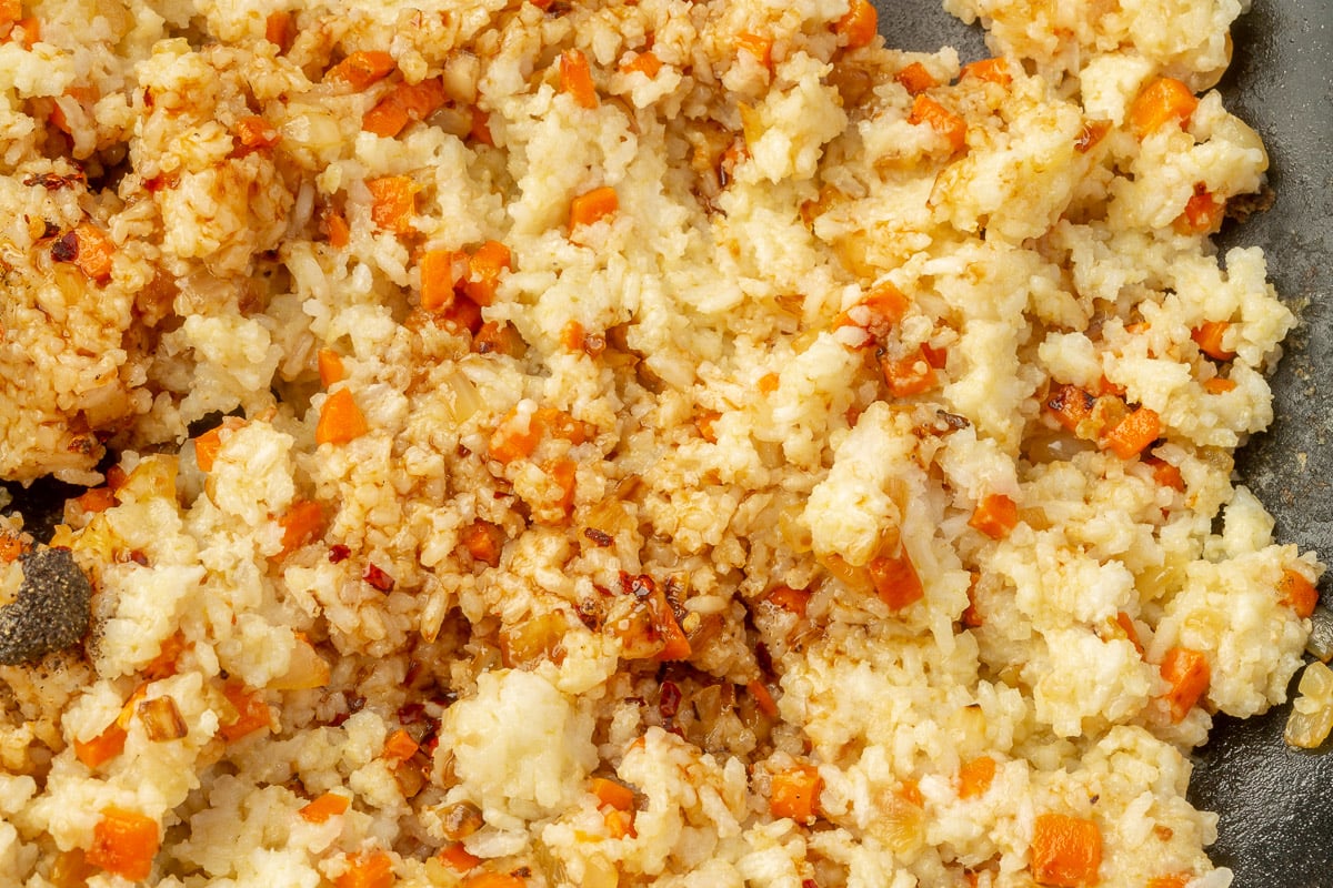 Rice coated in gluten-free soy sauce and seasonings for fried rice.