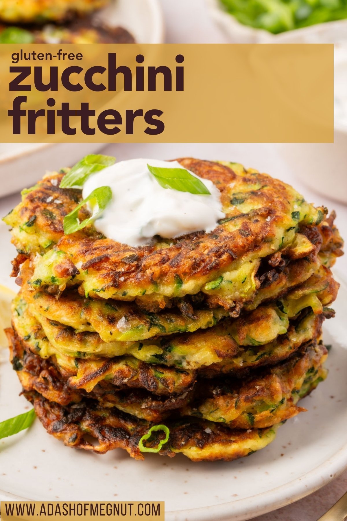 Pinterest graphic of stacked gluten-free zucchini fritters topped with sour cream and green onion, labeled with recipe title and blog name.