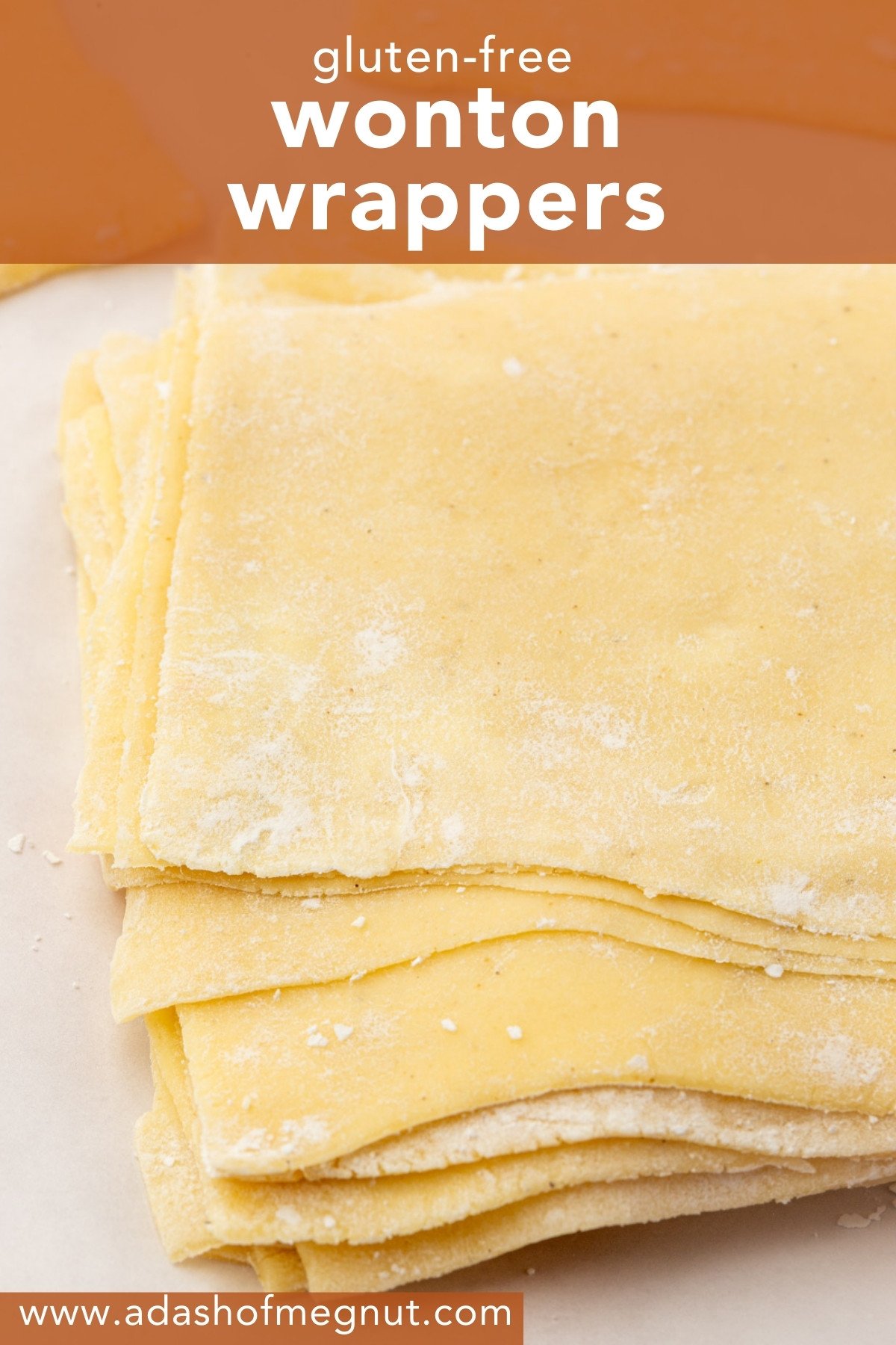 Stack of homemade gluten-free wonton wrappers dusted with starch.