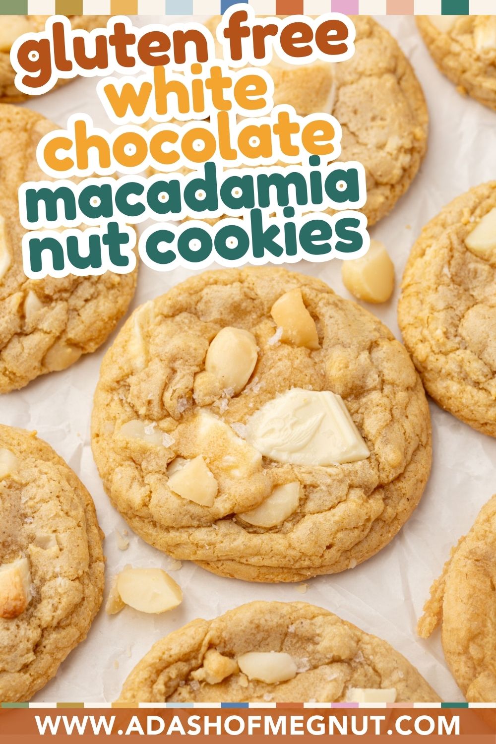 Overhead view of gluten-free white chocolate macadamia nut cookies on parchment paper with visible chunks of white chocolate and macadamia nuts.